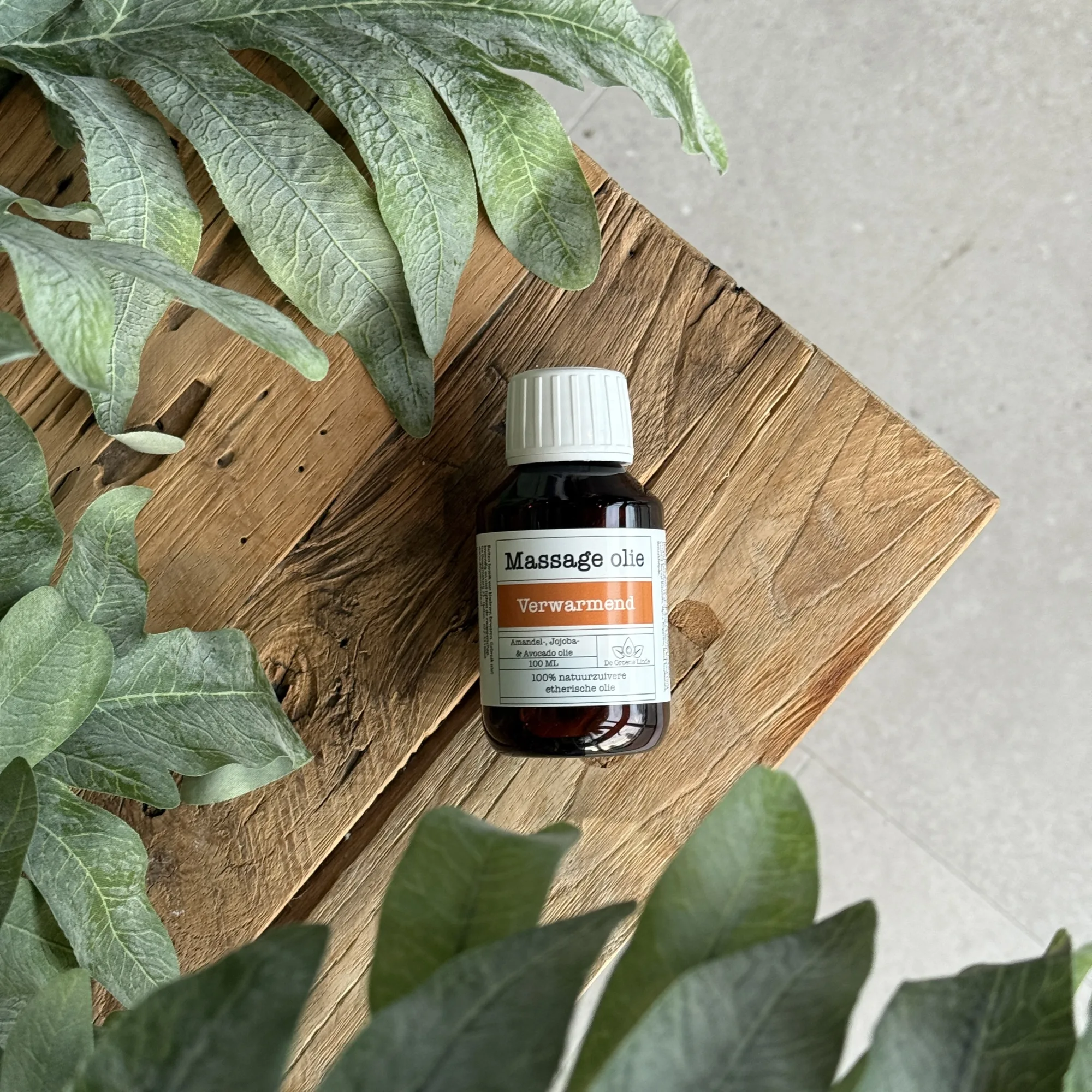 Verwarmend Massageolie kant en klaar in 50 ml PET flesje met dop van De Groene Linde